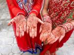 Mehndi hands ddecorations at a wedding ceremony