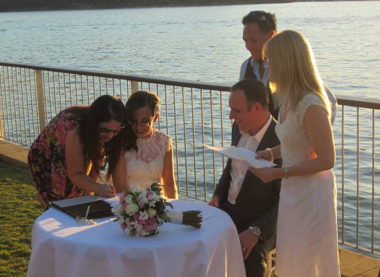 Signing the marriage registry in Lucinda Park, Palm Beach