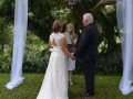 under the canopy at a wedding